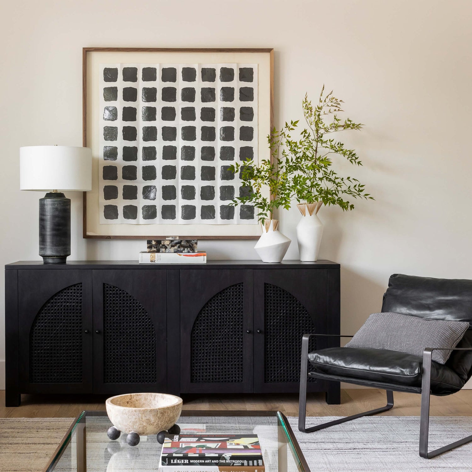 Dayton ceramic table lamp featuring a textured, time-worn ebony finish in a cylindrical silhouette, topped with a natural linen drum shade and polished nickel finial—blending industrial charm with refined design-6