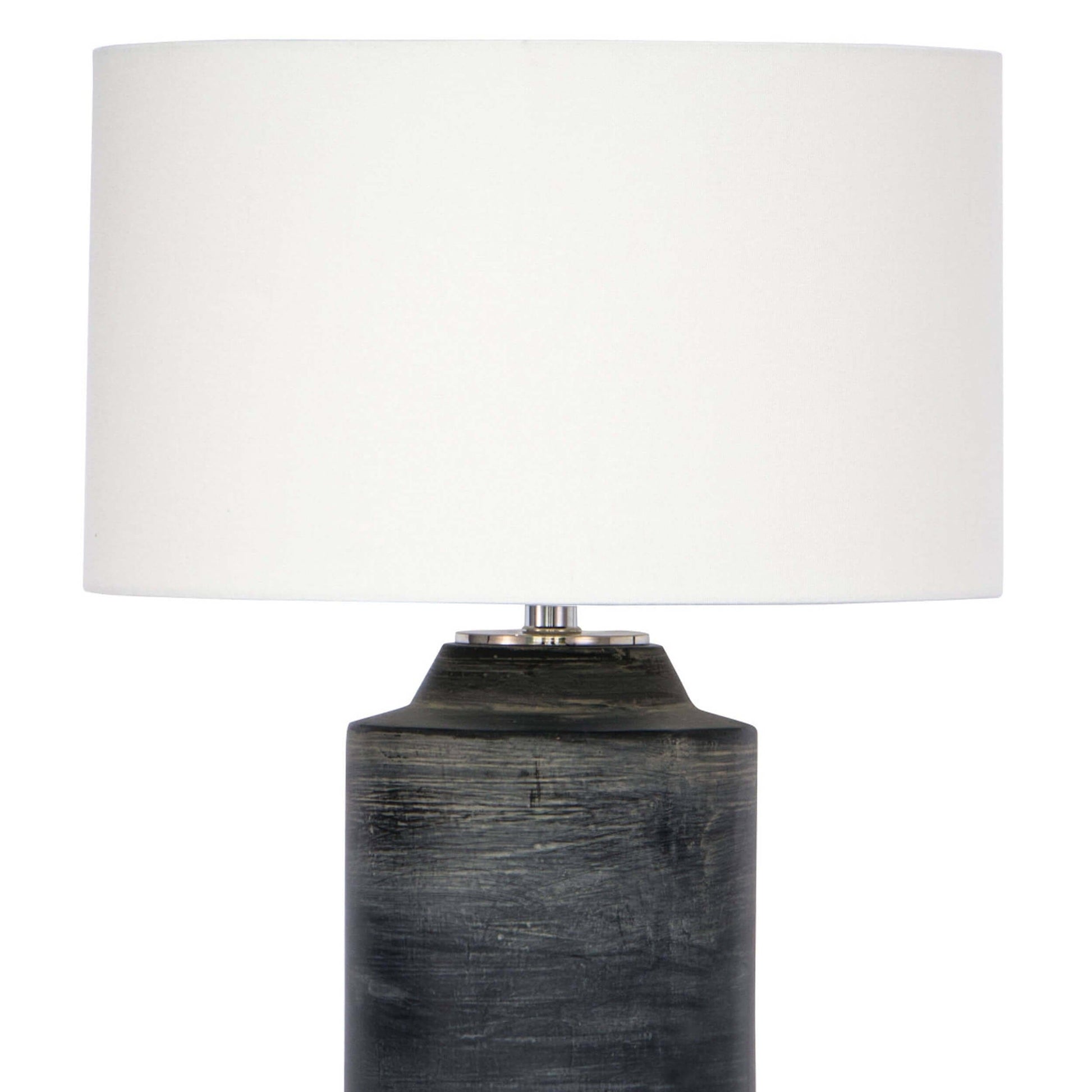 Dayton ceramic table lamp featuring a textured, time-worn ebony finish in a cylindrical silhouette, topped with a natural linen drum shade and polished nickel finial—blending industrial charm with refined design-2