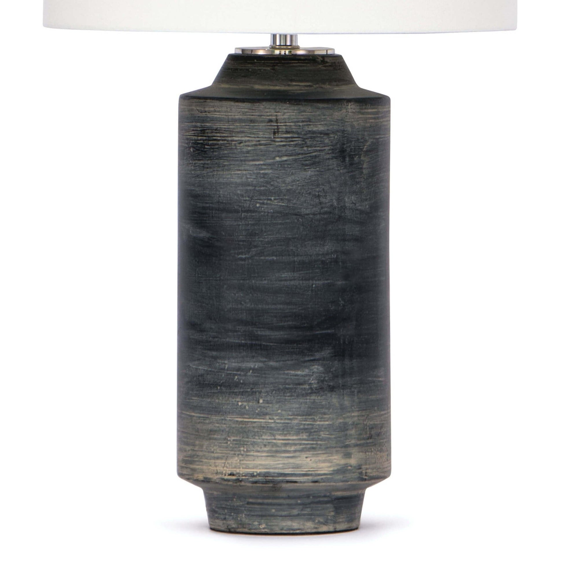 Dayton ceramic table lamp featuring a textured, time-worn ebony finish in a cylindrical silhouette, topped with a natural linen drum shade and polished nickel finial—blending industrial charm with refined design-3